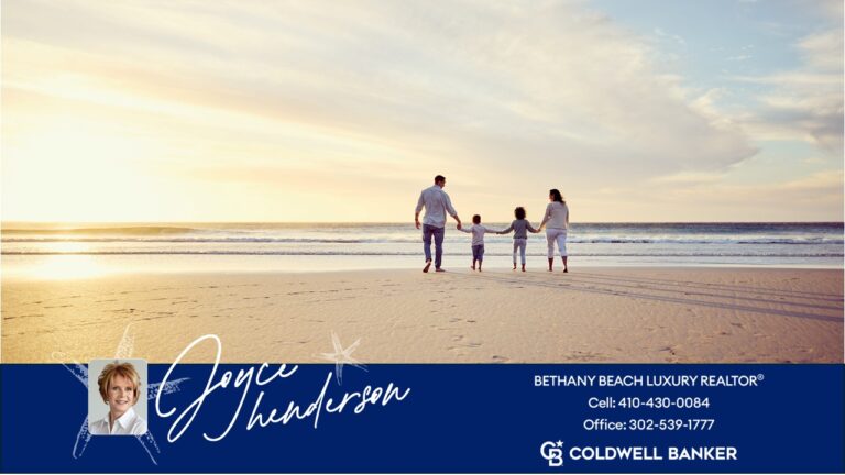 Family walking on Bethany Beach at sunrise in front of their luxury home